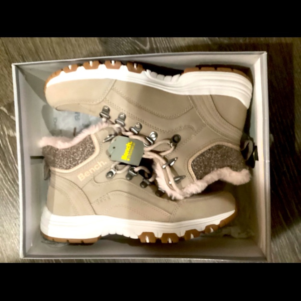 NWT in the box. Super cute boots! Size 9.5 US